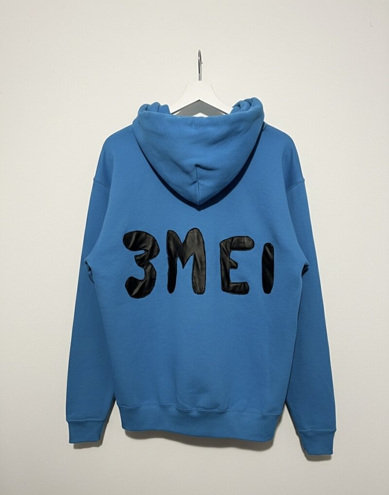 felpa-azzurra-con-zip-inserto-pelle