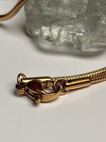 catenella-in-acciaio-placcato-oro-con-pendente
