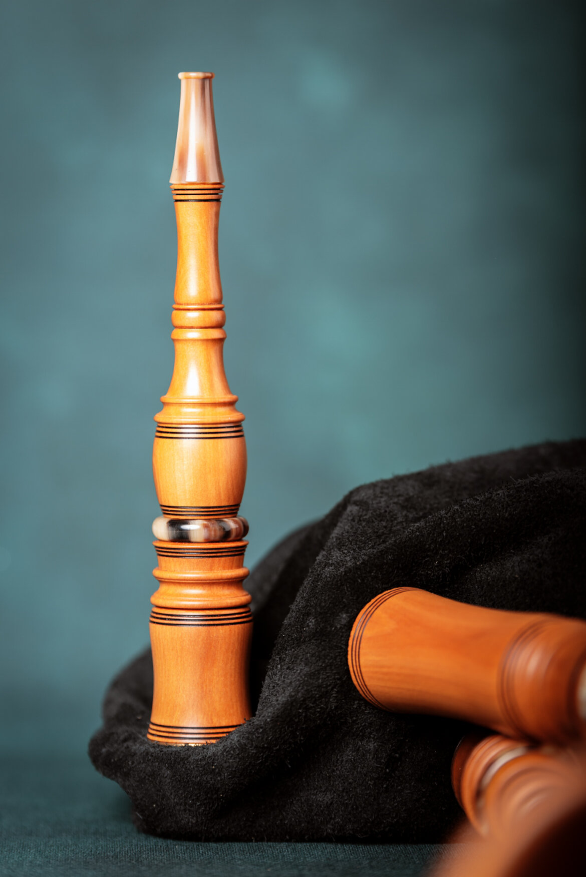 Blowpipe with cow horn mouthpiece