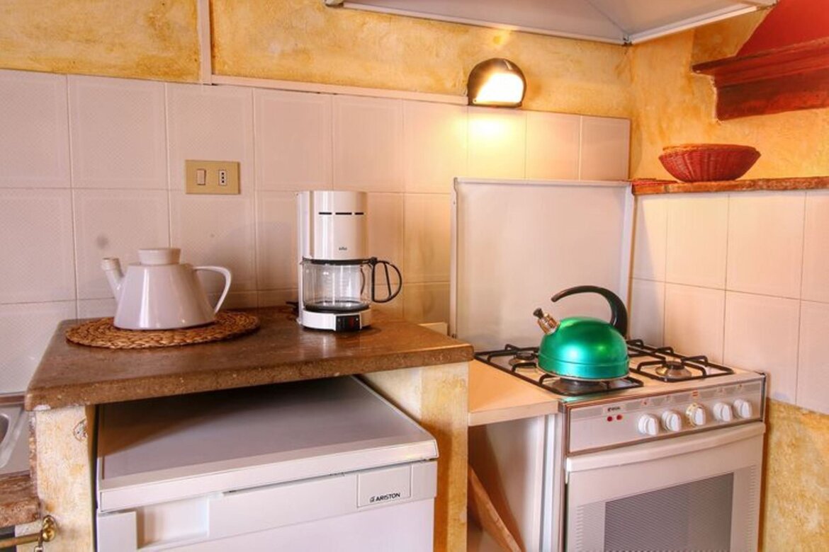 Soggiorno-angolo cottura appartamento Terrazzo
