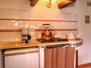 Soggiorno-angolo cottura appartamento Oliviera