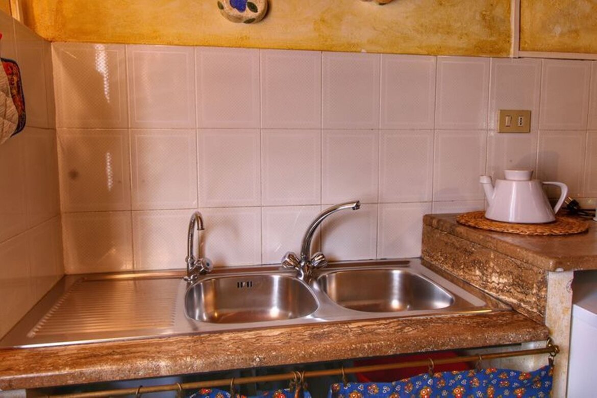 Soggiorno-angolo cottura appartamento Terrazzo
