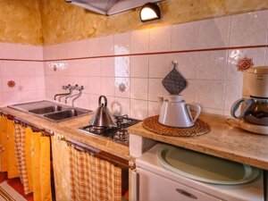 Soggiorno -angolo cottura appartamento Granaio