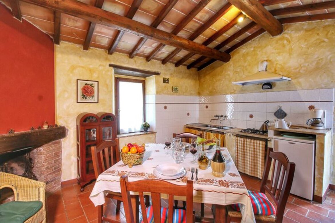 Soggiorno -angolo cottura appartamento Granaio