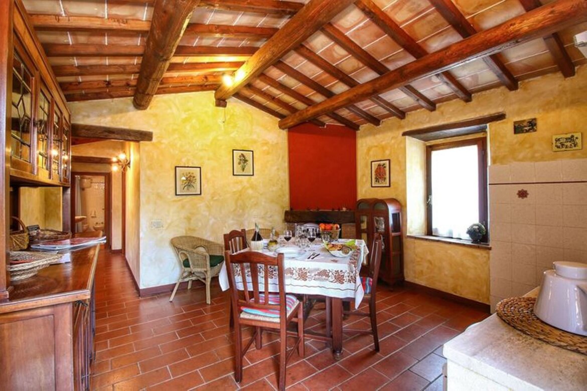 Soggiorno -angolo cottura appartamento Granaio