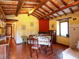 Soggiorno -angolo cottura appartamento Granaio