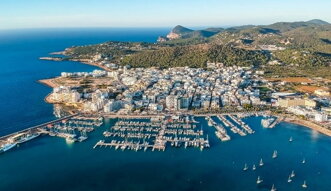 ibiza-port-san-antonio-ferries-boats-town-green-hills-blue-sea.jpeg