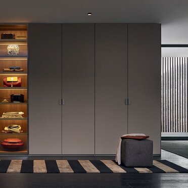 Sistema PL5 Sistema armadio ampia componibilità Ante battente e moduli giorno integrati