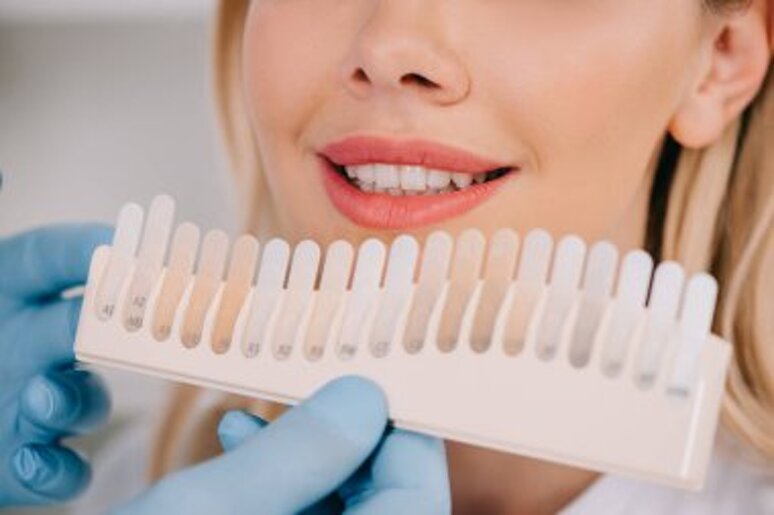 depositphotos_245902296-stock-photo-cropped-view-male-dentist-matching.jpeg