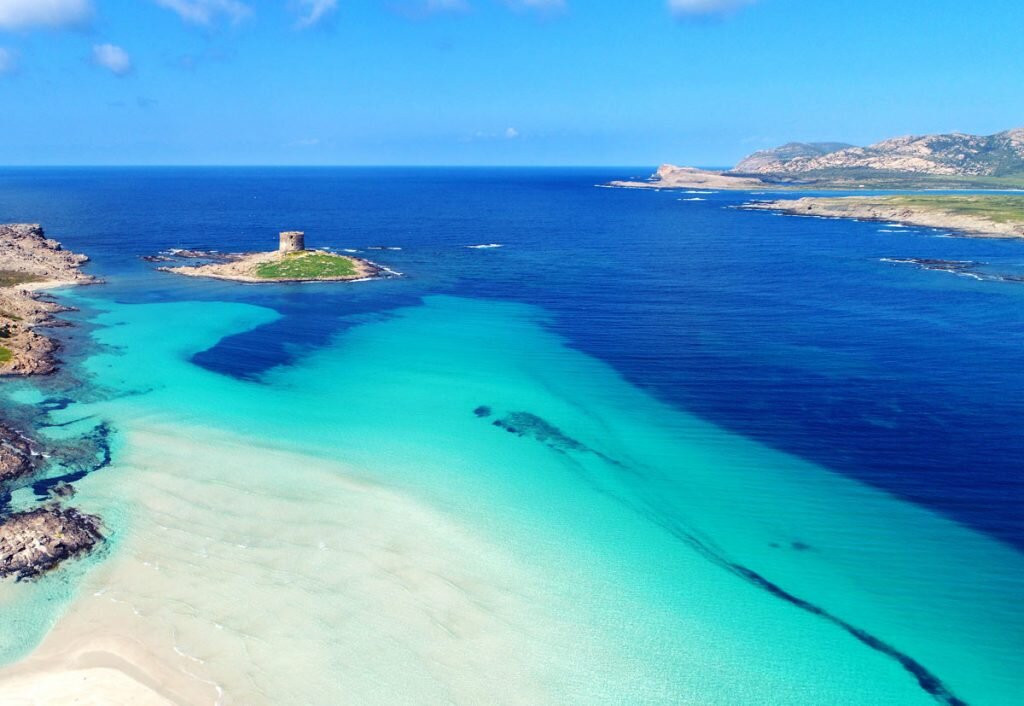 Spiaggia La Pelosa: un paradiso in Sardegna a due passi da Villa Malvasio Spiaggia La Pelosa: un paradiso in Sardegna a due passi da Villa Malvasio