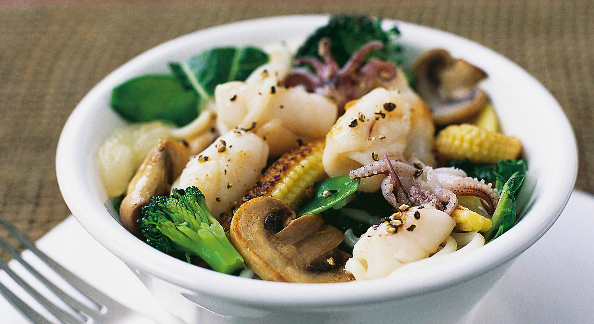Seppie saltate con verdure