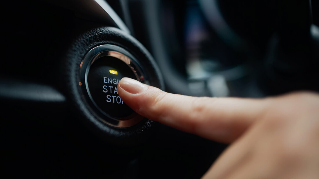 vecteezy_close-up-of-a-hand-pressing-the-engine-start-button-in-a_75350467.jpeg