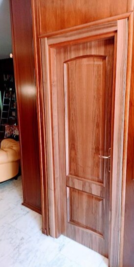 PORTA NOCE NAZIONALE BOISERIE NOCE NAZIONALE CON PORTA IN NOCE NAZIONALE