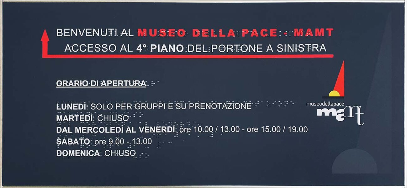 targa in quadricromia e rilievo tattile.