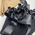 parigine-donna-con-fiocco