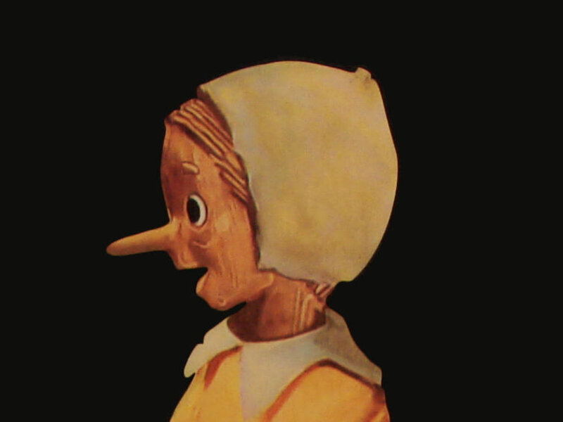 Contorno del viso di Pinocchio che costituisce la parte alta dell?orologio a pendola