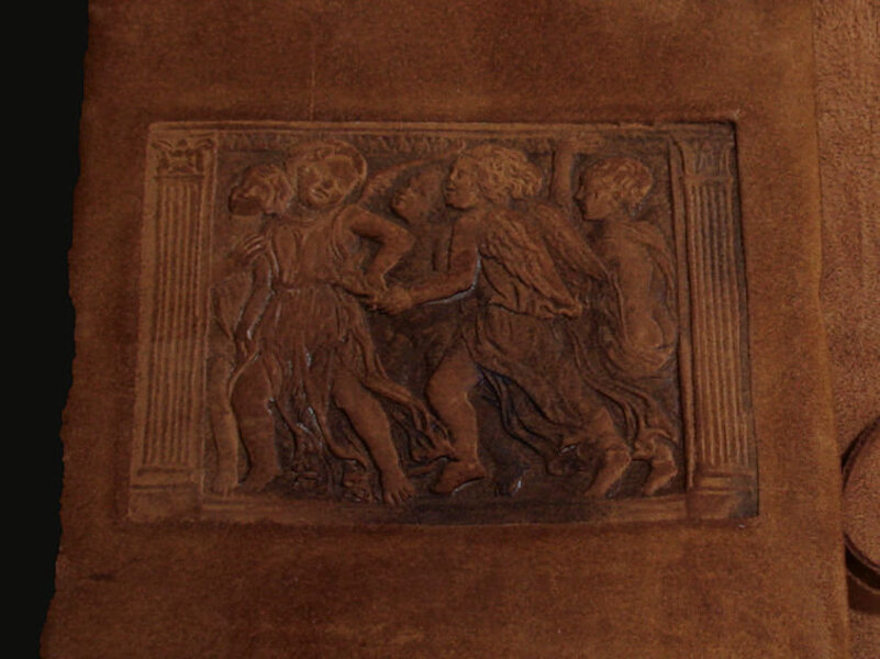 Quaderno con decorazione su pelle fatta con bronzo caldo e pressa a snervare la pelle