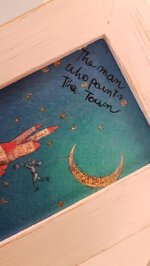 lomino-che-dipinge-la-citta-con-cornice-mignon