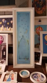 lomino-che-raccoglie-le-stelle-cadenti-con-cornice