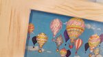 la-citta-delle-mongolfiere-con-cornice-the-hot-air-balloons-village-with-frame