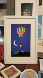 mongolfiera-nella-notte-con-cornice-hot-air-balloon-in-the-night-with-frame