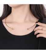 lamucollana-rigida-in-acciaio-inox-oro-con-perline-rimovibili