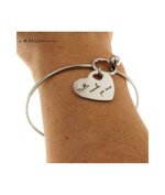 lamu-bracciale-rigido-in-acciaio-inox-con-cuore-inciso-nulla-accade-per-caso-riferimento-ot10329