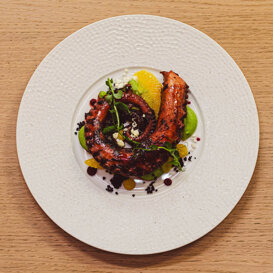 Calamaro polpo sui piselli