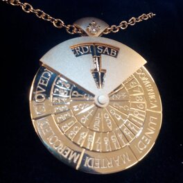 750 gold pendant Perpetual calendar rotating 750 yellow gold pendant with diamond