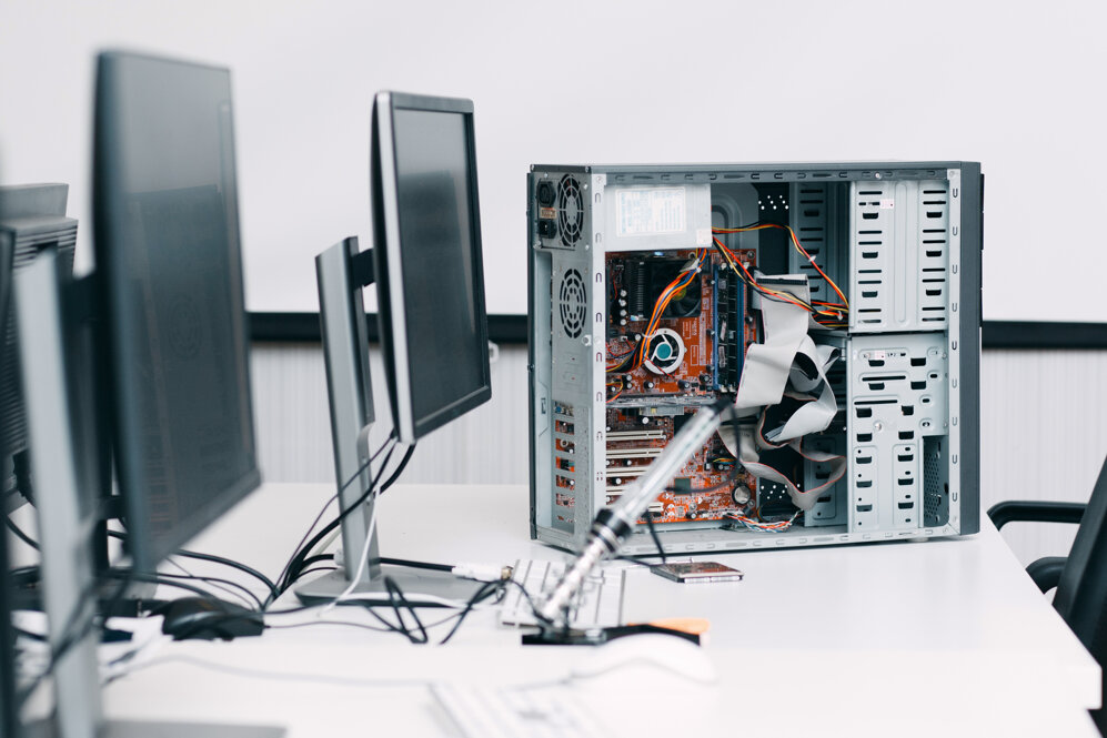 disassembled-computer-unit-table-with-monitors-electronic-repair-shop-workshop-industry-renovation-concept.jpeg