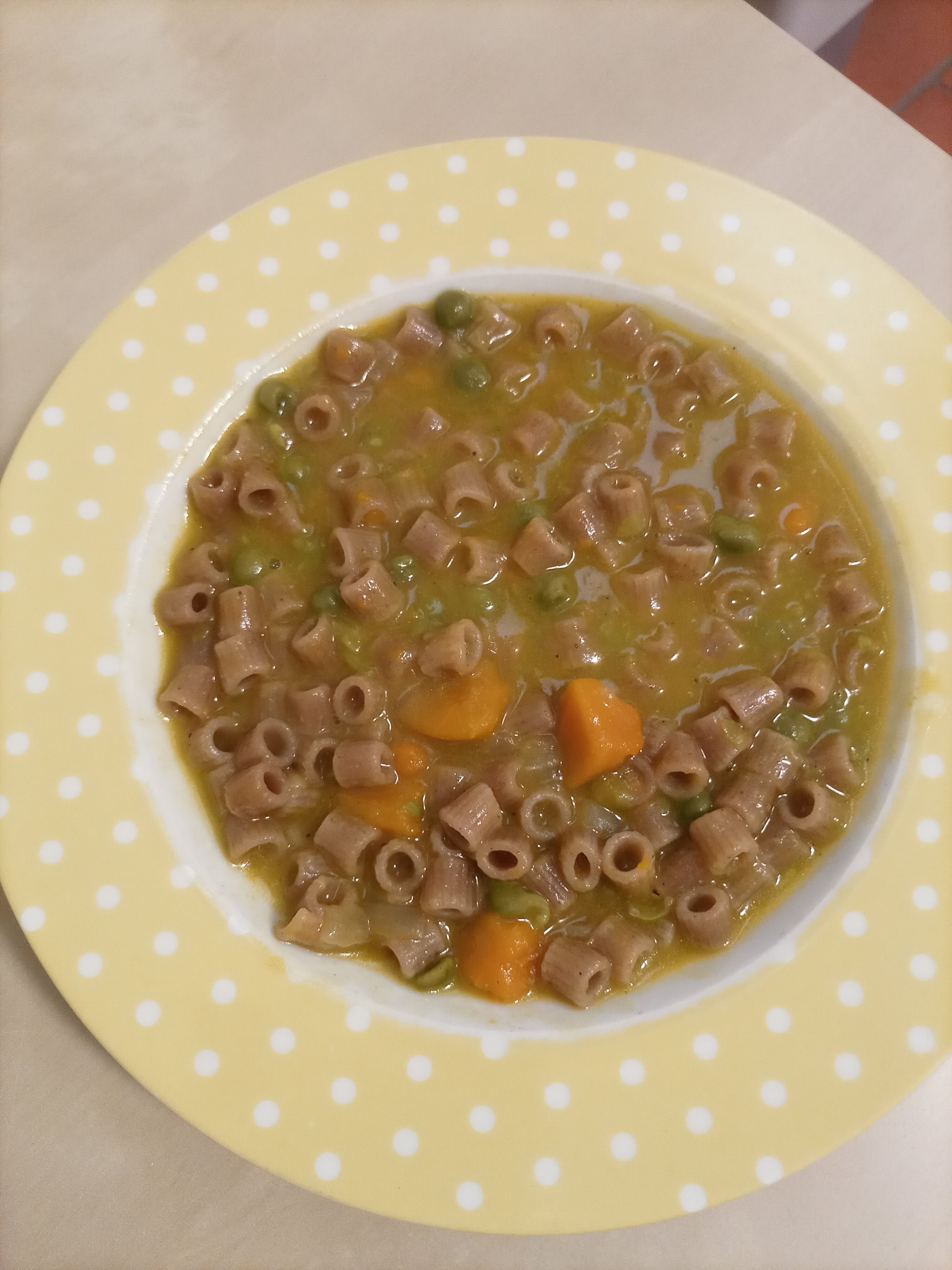 Ditaloni con zucca e piselli cremosi