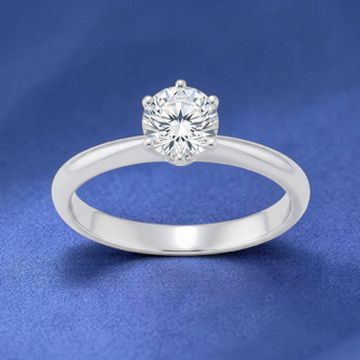 Gioielleria Fugazzi Bocciarelli. Anello solitario oro bianco e diamanti