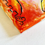 carnevale-divrea-mano-con-arancia