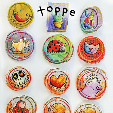Toppe Toppe con varie illustrazioni