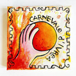 carnevale-divrea-mano-con-arancia