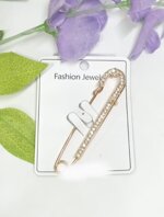 spilla-dorata-con-strass