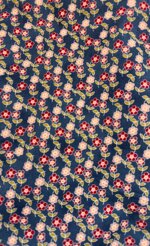 stoffa-fiorellini-risa-e-fucsia-fondo-blu