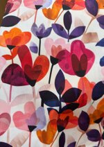 stoffa-fiori-rosa-viola-arancio-e-rosso