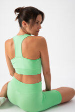 top-sportivo-donna-in-tessuto-tecnico-kaia-one-block-apple-heart-and-soul