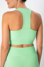 top-sportivo-donna-in-tessuto-tecnico-kaia-one-block-apple-heart-and-soul