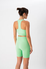 top-sportivo-donna-in-tessuto-tecnico-kaia-one-block-apple-heart-and-soul