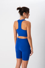 top-sportivo-donna-in-tessuto-tecnico-kaia-one-block-blue-heart-and-soul