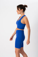 top-sportivo-donna-in-tessuto-tecnico-kaia-one-block-blue-heart-and-soul