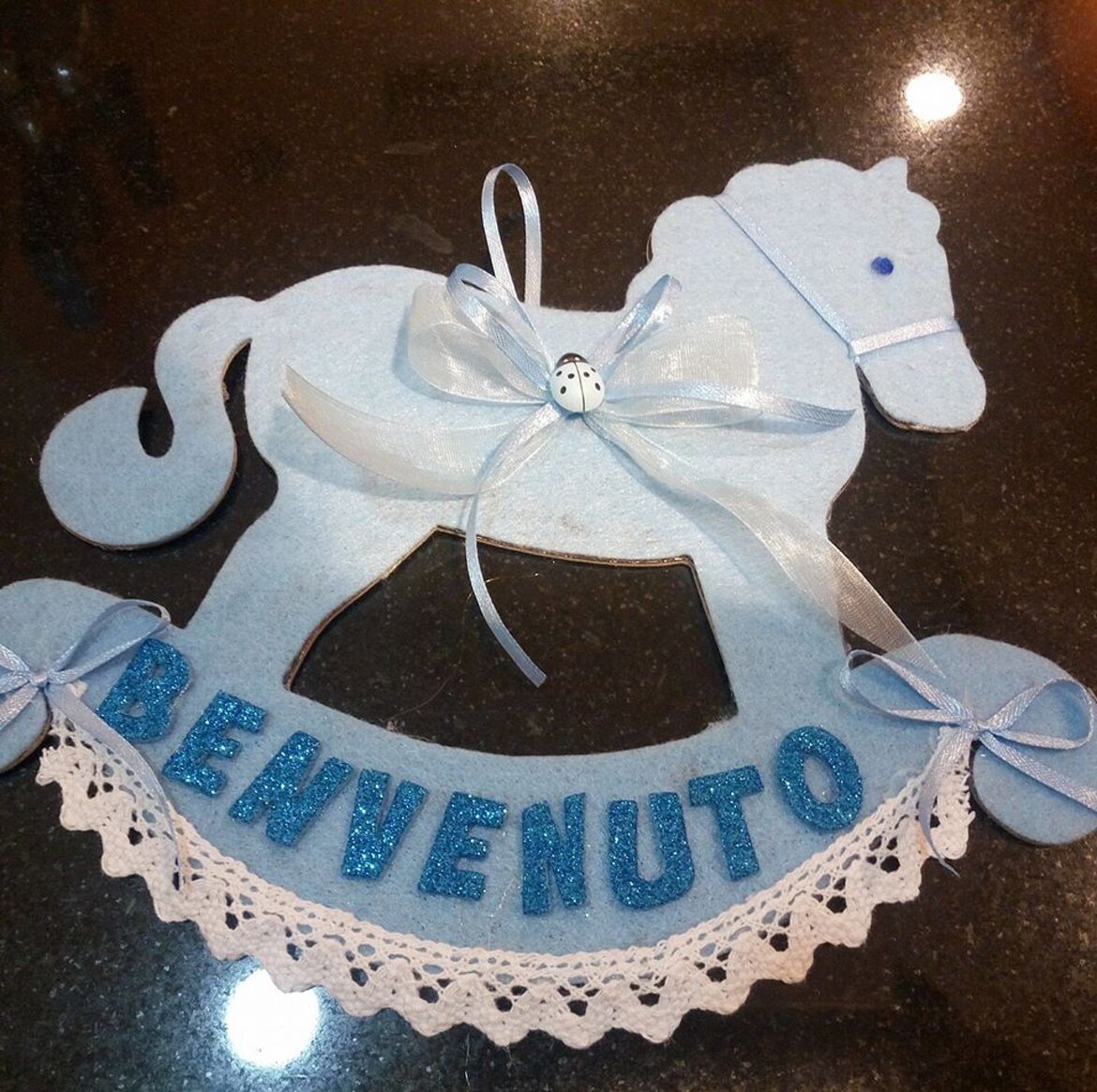 cavalluccio dietroporta nascita bimbo