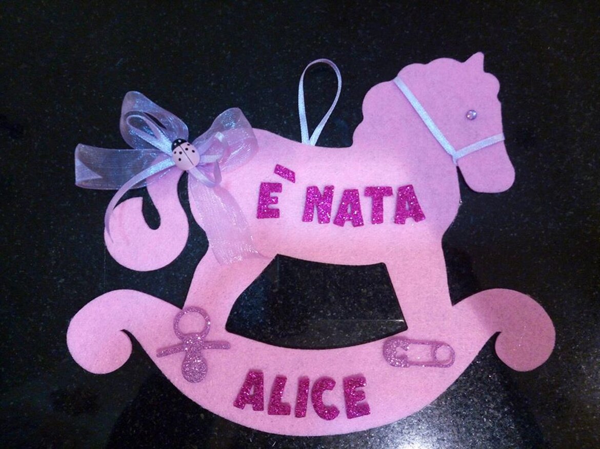 cavalluccio dietroporta nascita bimba