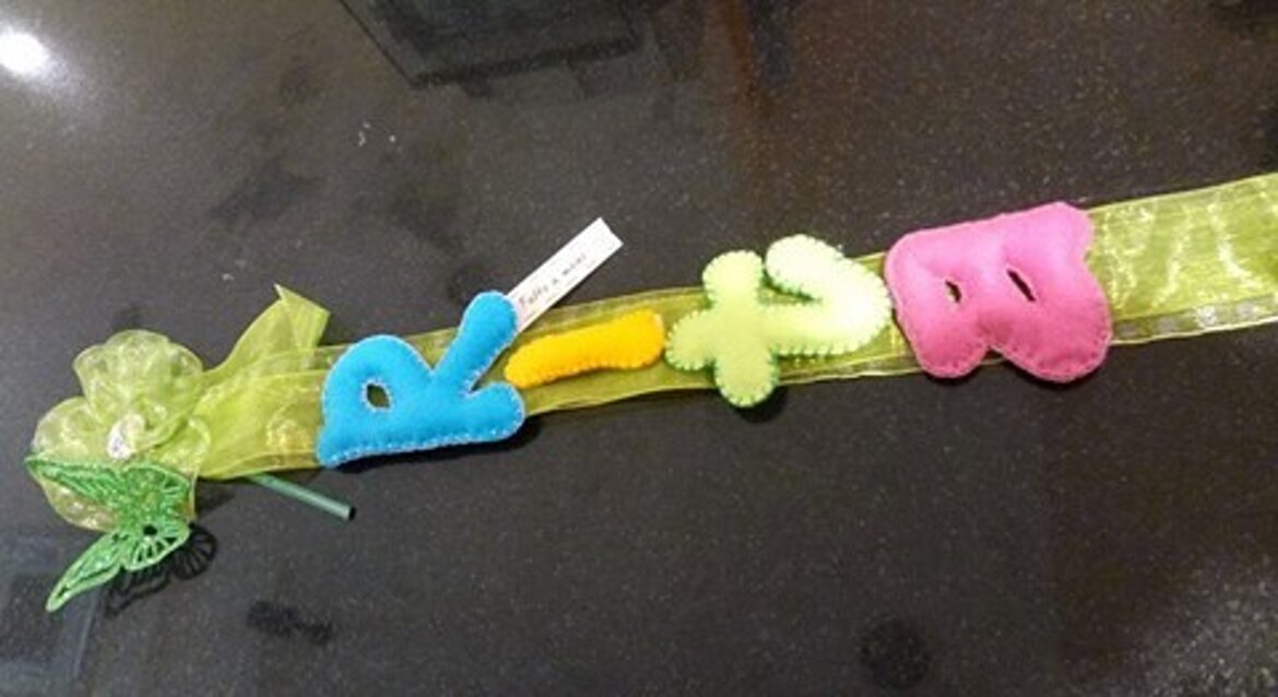 banner dietro porta rita