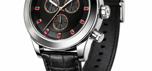 Ideazione e modellazione 3D con rendering orologio cronografo di design contemporaneo con quadrante nero, rubini rossi