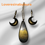 parure-orecchini-e-pendente-oro-nero