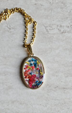 pendente-trasparente-con-fiorellini-essiccati