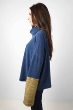 dolcevita-blu-con-polsi-oro